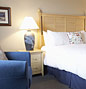 Osprey Shores deluxe room with two club chairs.